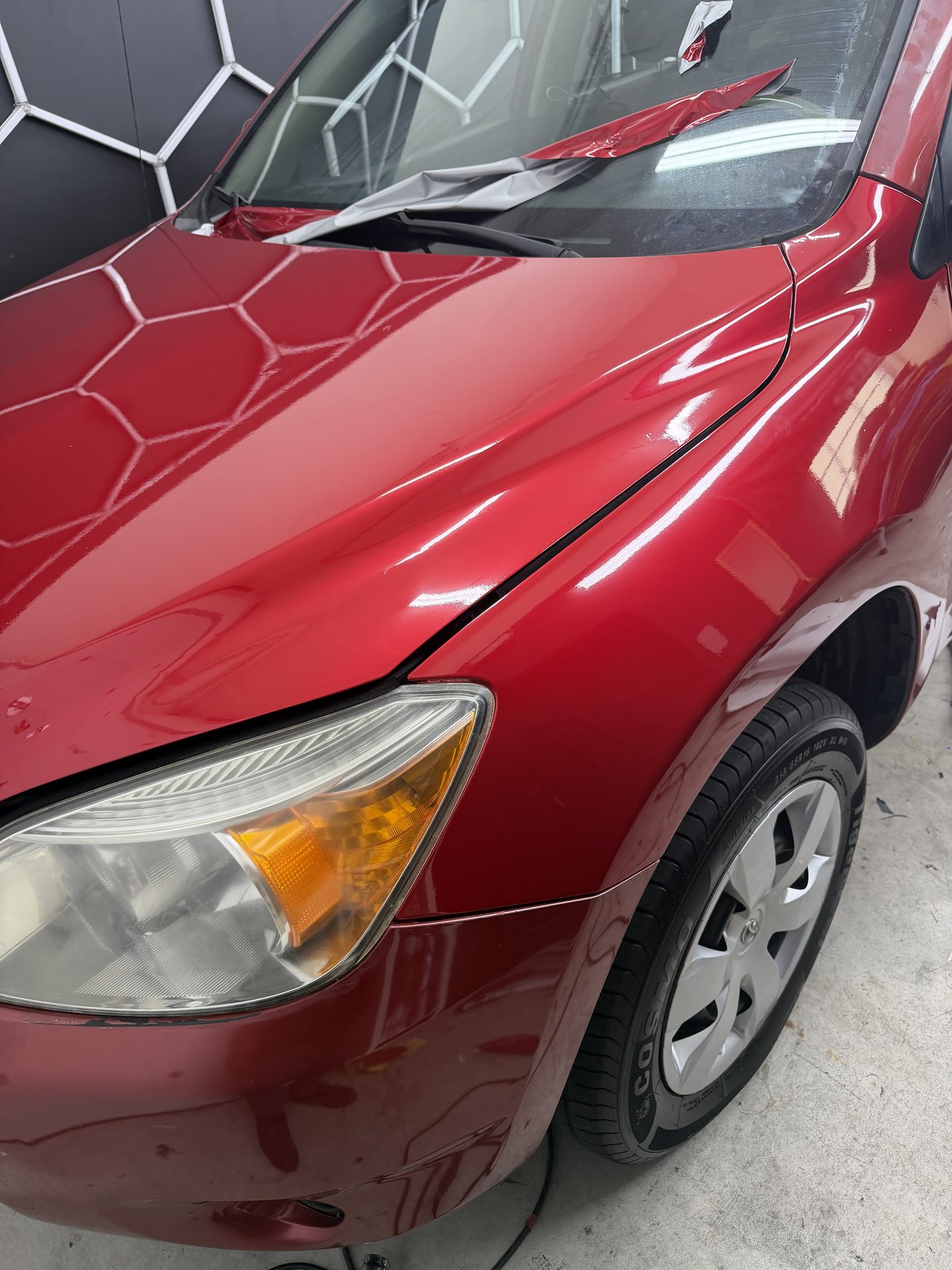 Panel work in progress on a vehicle in the shop