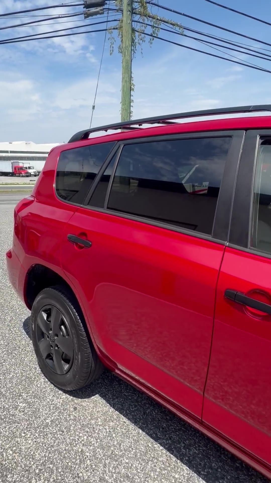 The same SUV after a full color change wrap completed at the shop